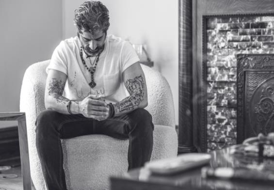 Uday sitting, contemplative