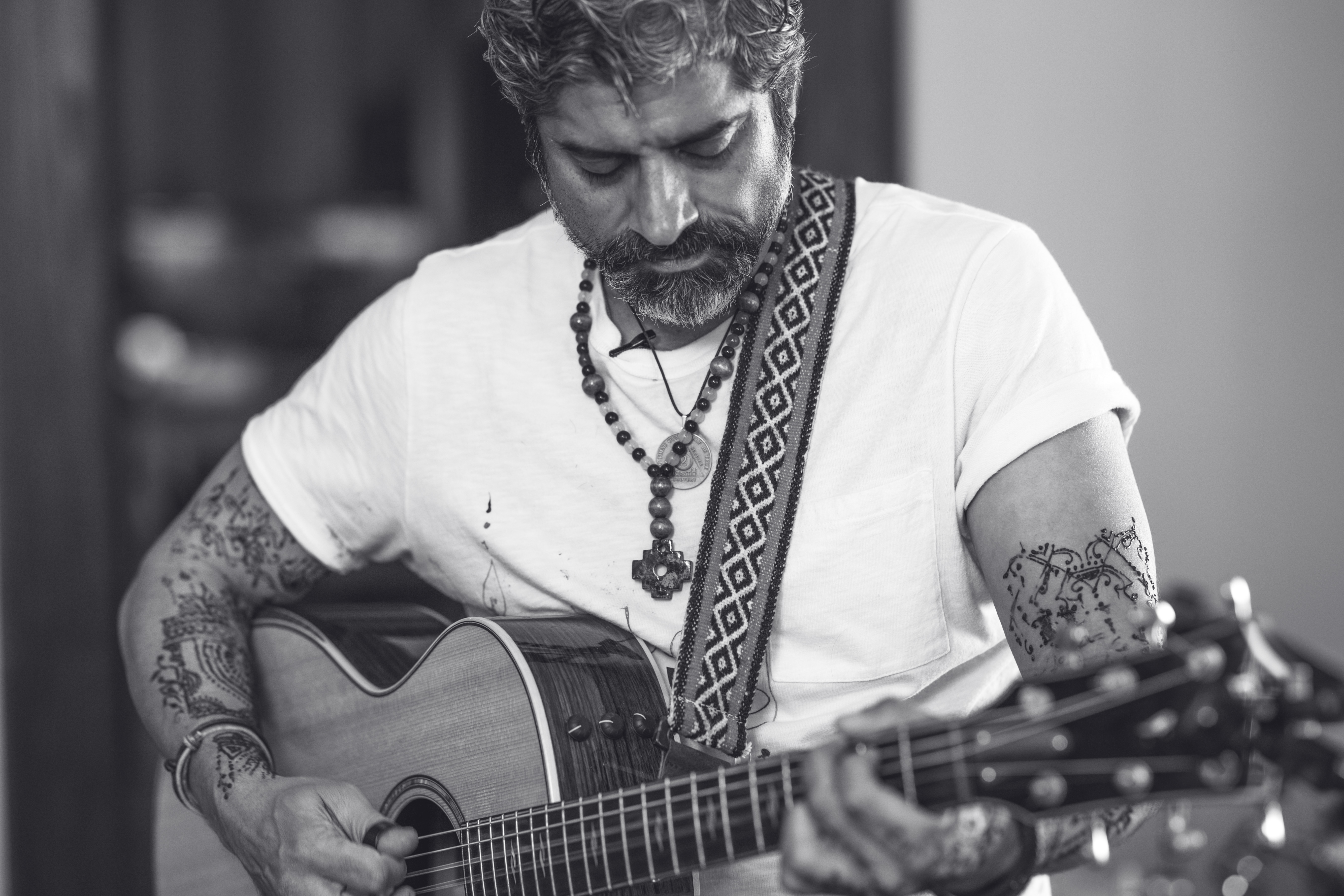 Uday playing guitar